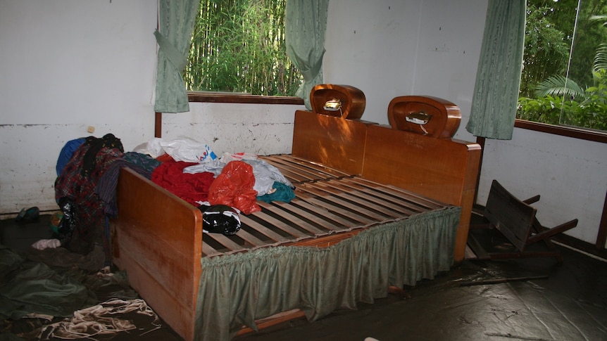 Bedroom damaged by floodwaters