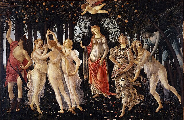 A stylised early Renaissance painting of spring, featuring women gathered in a grove full of fruit beneath a cherub.