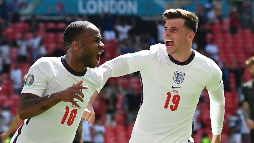 Raheem Sterling shouts with delight as Mason Mount runs in to congratulate his goal