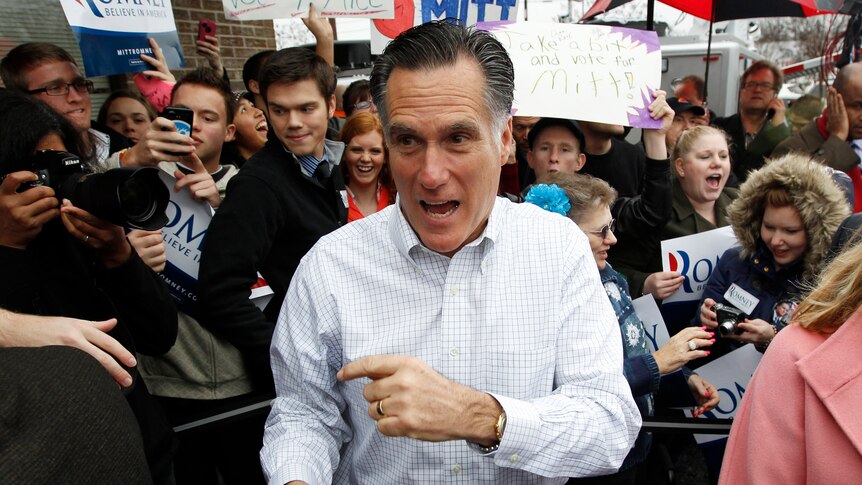 Mitt Romney greets supporters