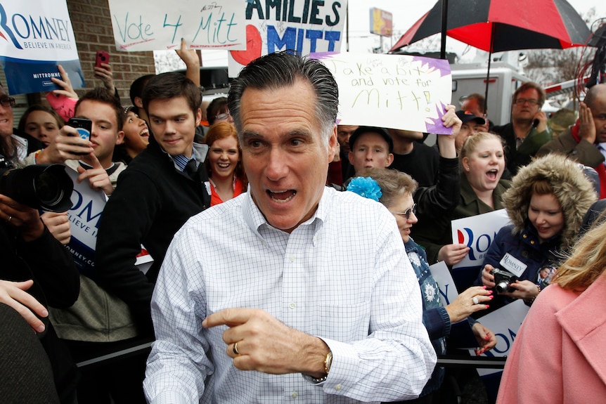 Mitt Romney greets supporters