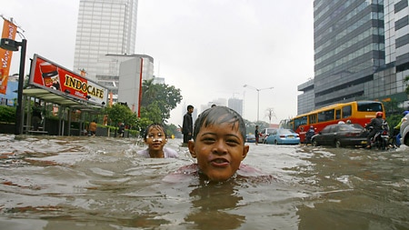Roads blocked: Floods have inundated Jakarta after several days of heavy rain.