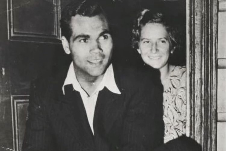 A black and white photo from the 1940s showing a young man next to a young woman, smiling.