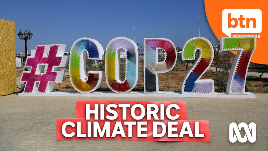 Large sculptural letters spell #COP21 on a sunny day. 