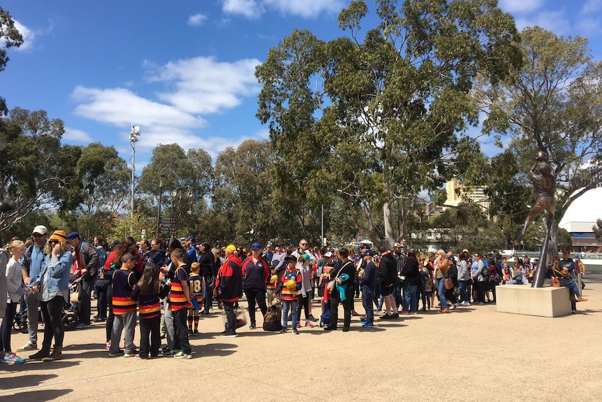 Crows fans gather outside Adelaide Oval.