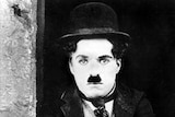 Charlie Chaplin in the movie The Kid