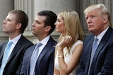 Donald Trump stands next to his children Ivanka Trump and Donald Trump Jr
