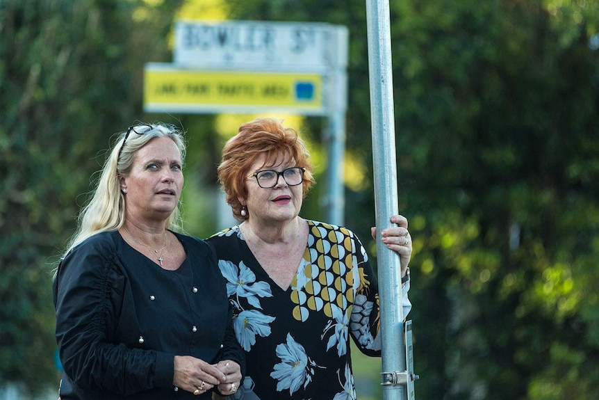 (LtoR) Leigh Anderson-Reid and Karen Harley stand in a street at Paddington in inner-city Brisbane.