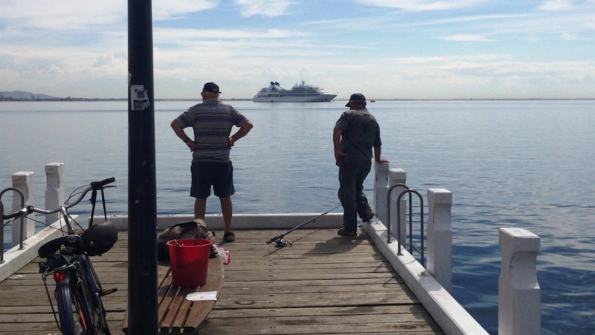 Fishermen dangling a line in Corio Bay