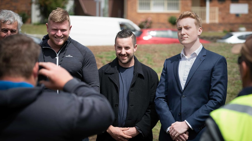 Blair Cottrell (left) and Oscar Tuckfield (right) at a rally organised by Cottrell's lawyer.