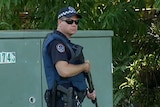 An armed police officer