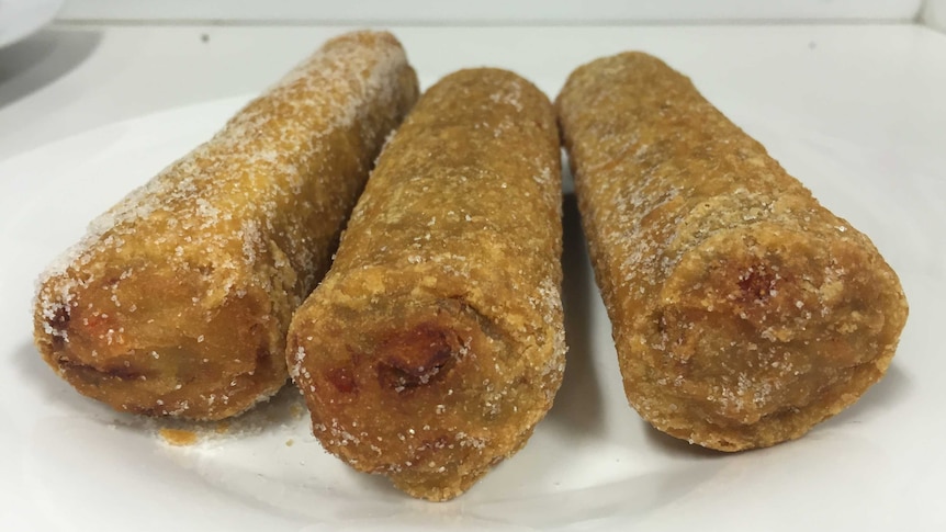 Three Chiko Rolls on a plate