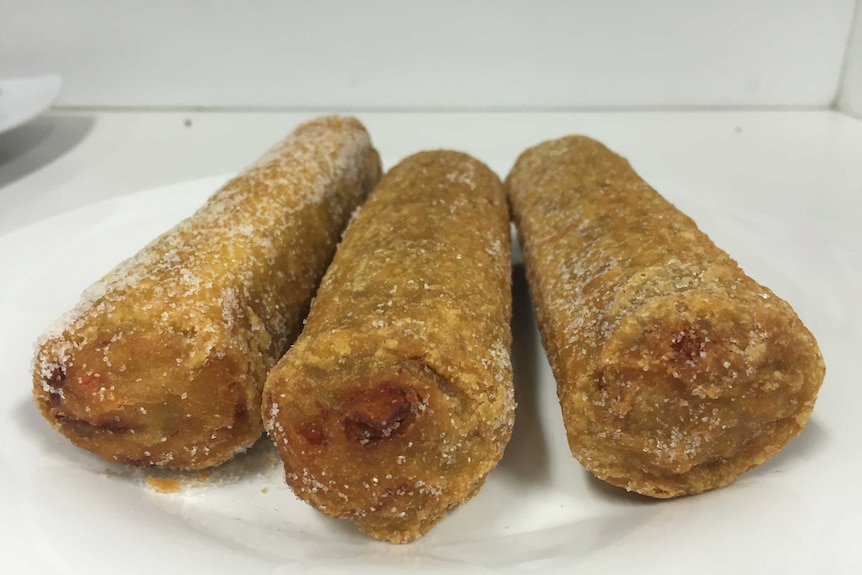 Three Chiko Rolls on a plate