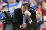 Umpire Arnaud Gabas ices his eye after being struck by a rogue ball at the Davis Cup in Ottawa