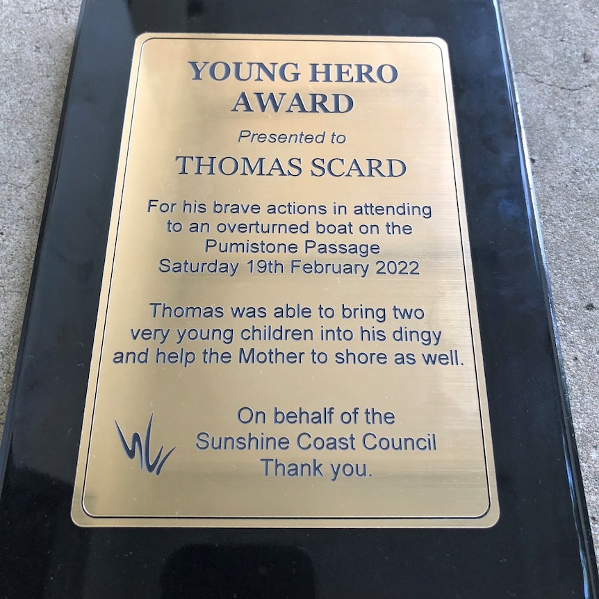 A plaque with writing on in explaining the award