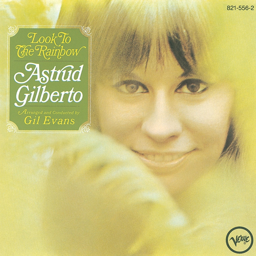 A close-up photo of Astrud Gilberto looking into the camera and smiling