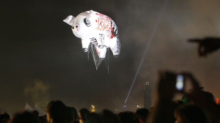 Better days: Roger Waters's giant pig as seen in the sky at the Coachella festival.