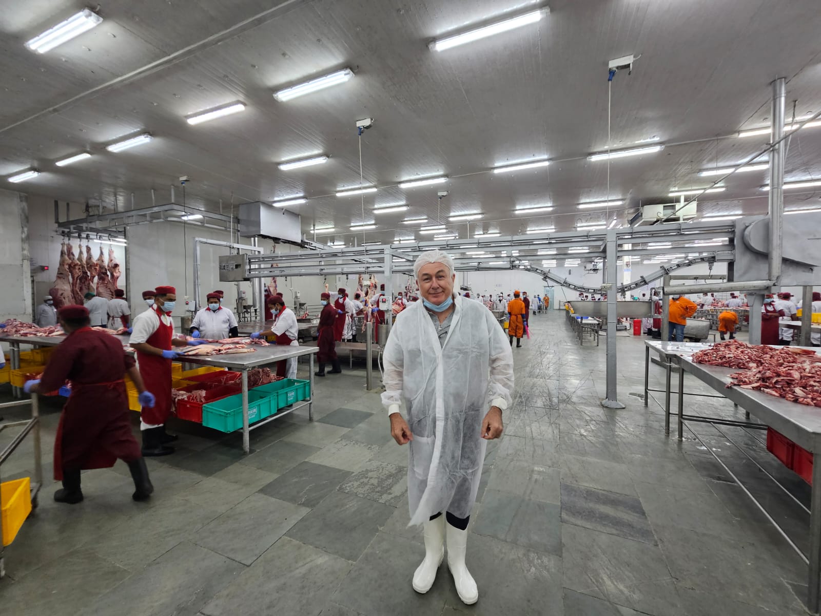 Simon Quilty from Global Agritrends.standing in abattoir