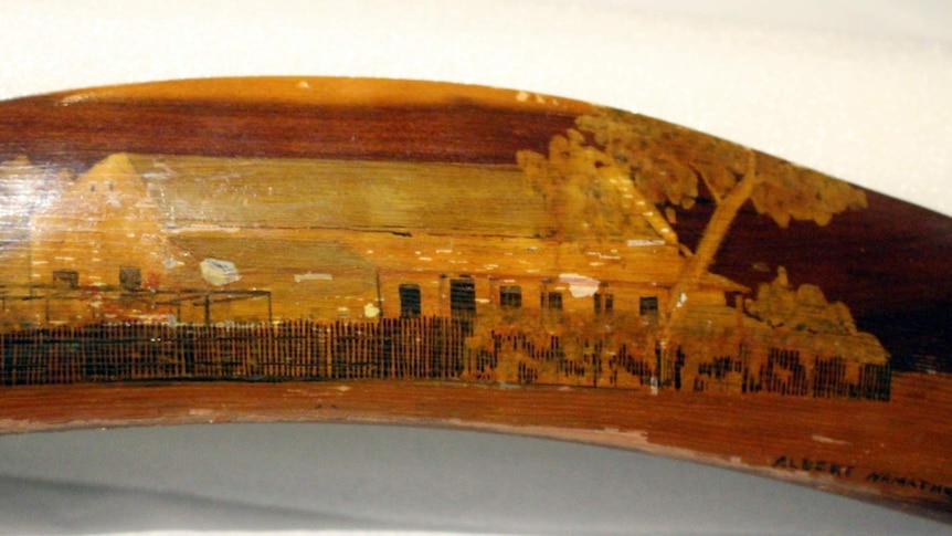Painting of the Hermannsburg missionaries' house on a boomerang made by Albert Namatjira, National Museum of Australia