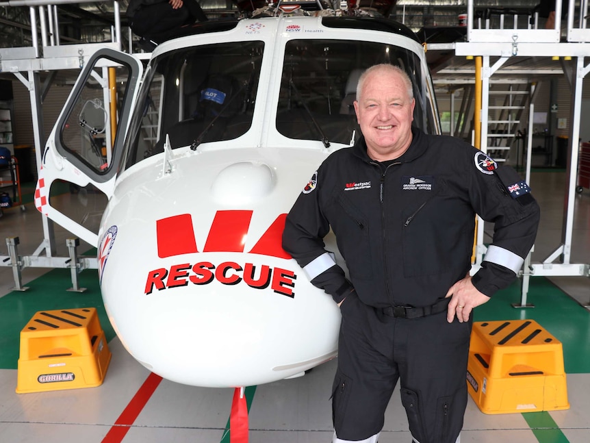 Graham Nickisson and a rescue helicopter