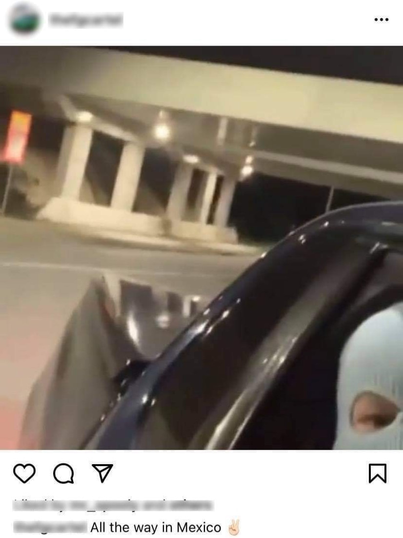 A social media post with a photo of a man in a car wearing a balaclava