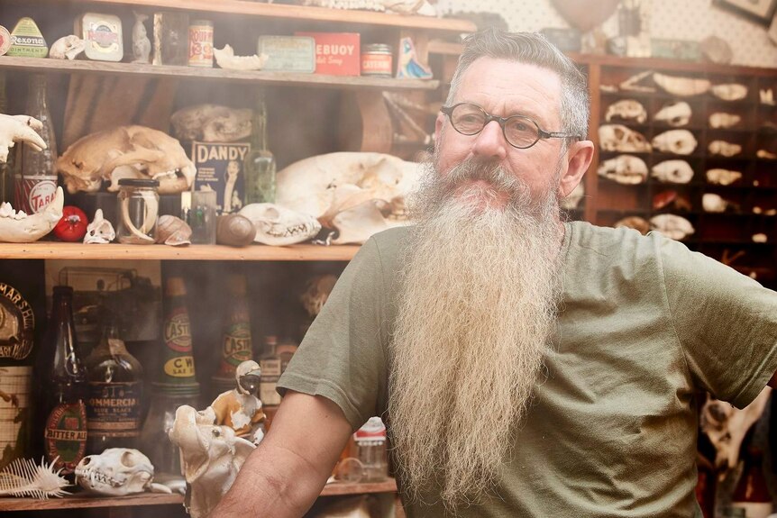 Ron Prendergast, former Bacchus Marsh Lion Safari Park keeper, in his woodshed in 2020.