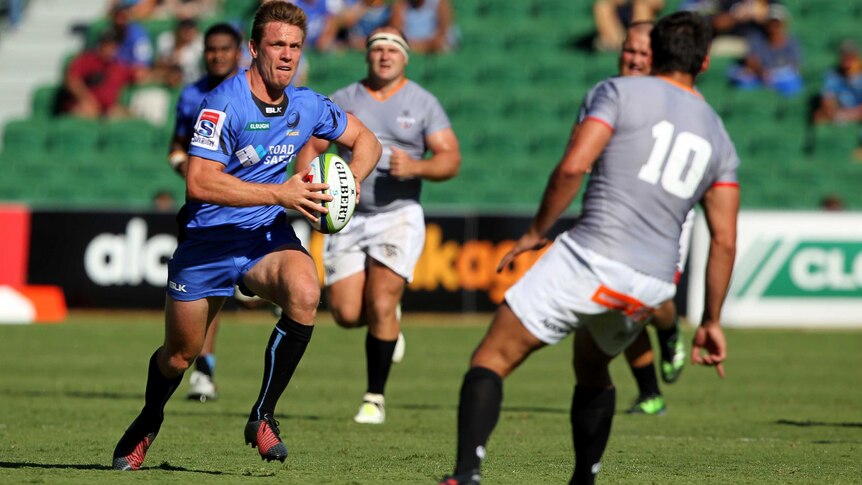 Dane Haylett-Petty of the Western Force runs towards an opponent while holding the ball.