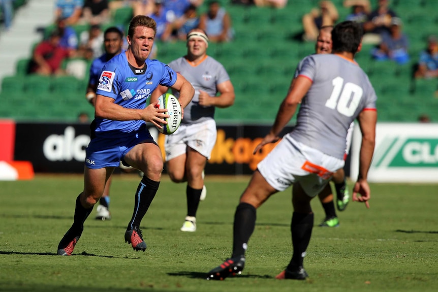 Dane Haylett-Petty of the Western Force runs towards an opponent while holding the ball.