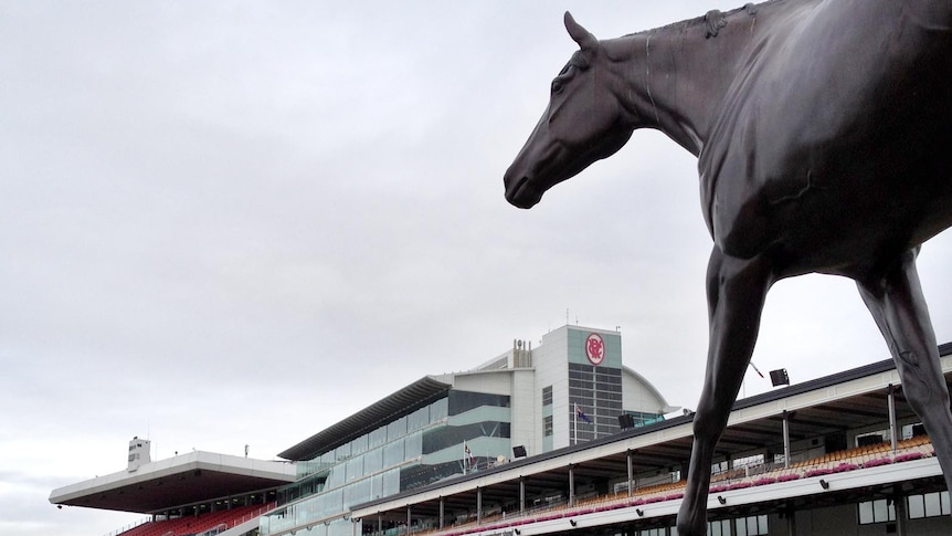 The statue of three-time champion, Makybe Diva, looks over Flemington race course in Melbourne.