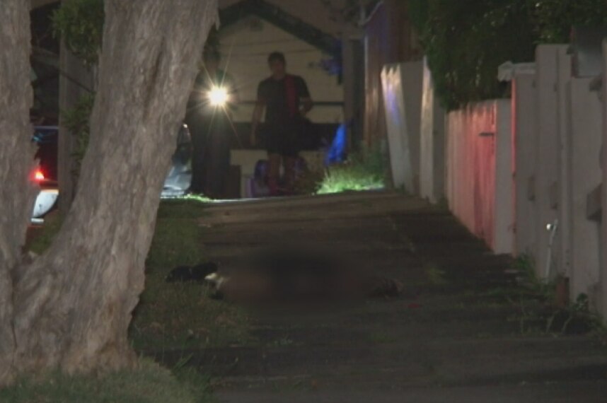 A blurred image of the victim of a fatal shooting.