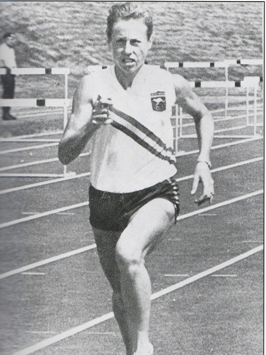 A newspaper clipping of an image of Judy Amoore Pollock running.