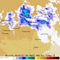 Photo of a weather radar showing rain falling in Central Australia.