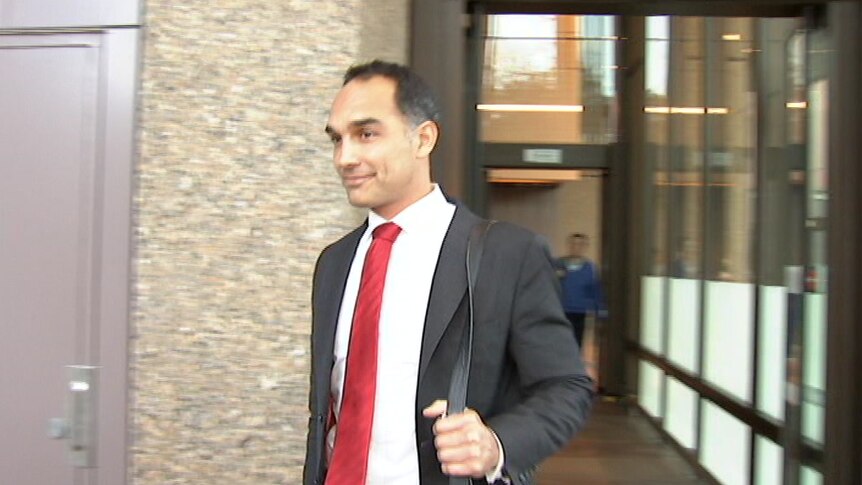 A man leaving court in a suit