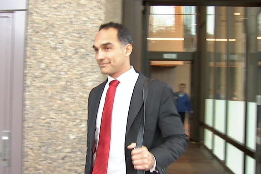 A man leaving court in a suit