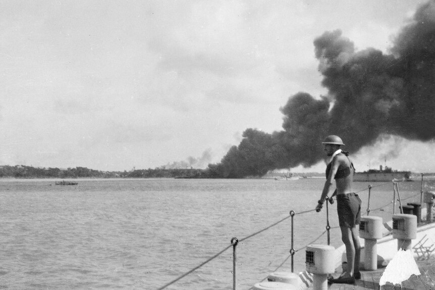 Smokes billows from MV Neptuna during Darwin air raid