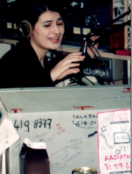 A young Patricia Karvelas speaks into a radio microphone