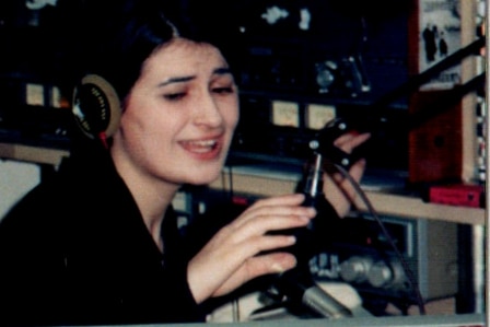 A young Patricia Karvelas speaks into a radio microphone
