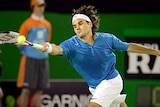 Made to work: Federer faced an unexpectedly tough opponent in Suzuki.