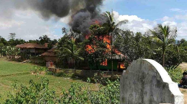 Village burning in Myanmar.