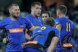 Western Force players wait for a try decision during the World Series Rugby match against Fiji in 2018.
