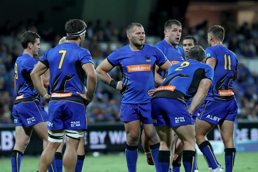 Western Force players wait for a try decision during the World Series Rugby match against Fiji in 2018.