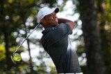 Tiger Woods watches his tee shot in the second round of the PGA Tour event in Virginia.