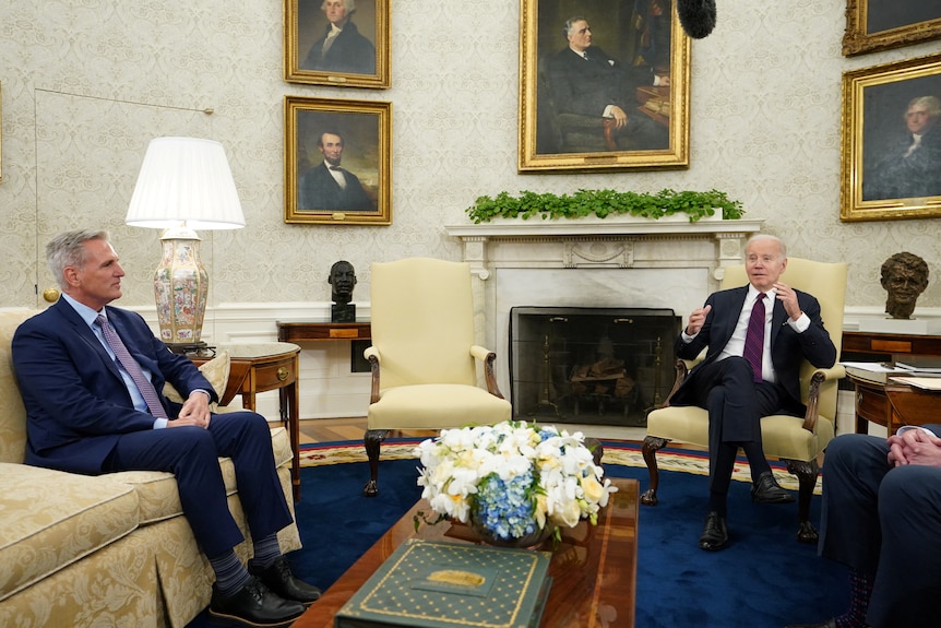 Joe Biden and Kevin McCarthy sit on the couches in the Oval Office
