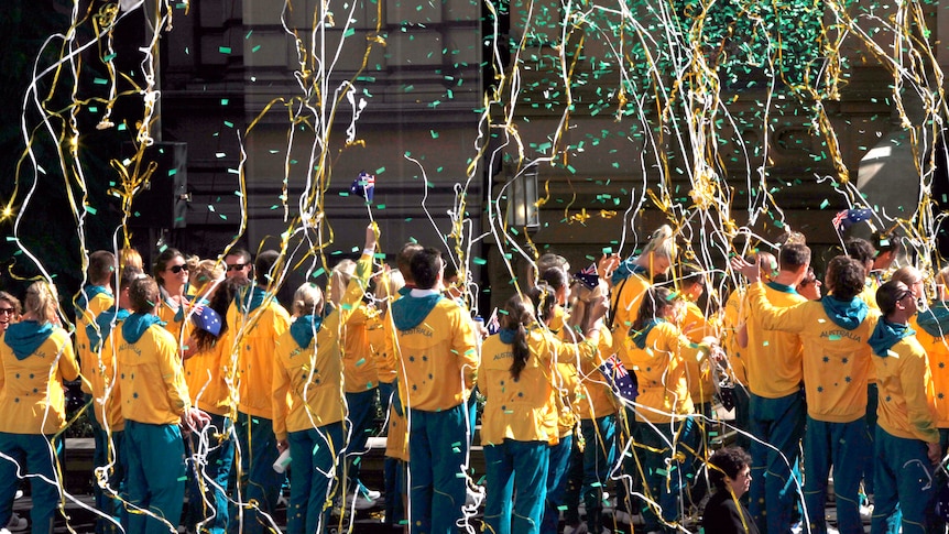 Streamers and confetti rain down on Australia's Olympic team in Sydney parade