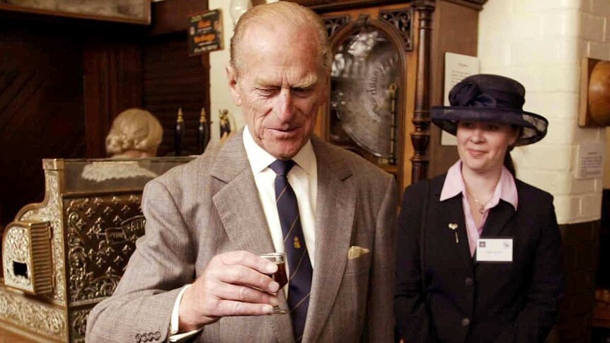 Prince Philip samples a glass of 'Jubilee ale' in 2002.