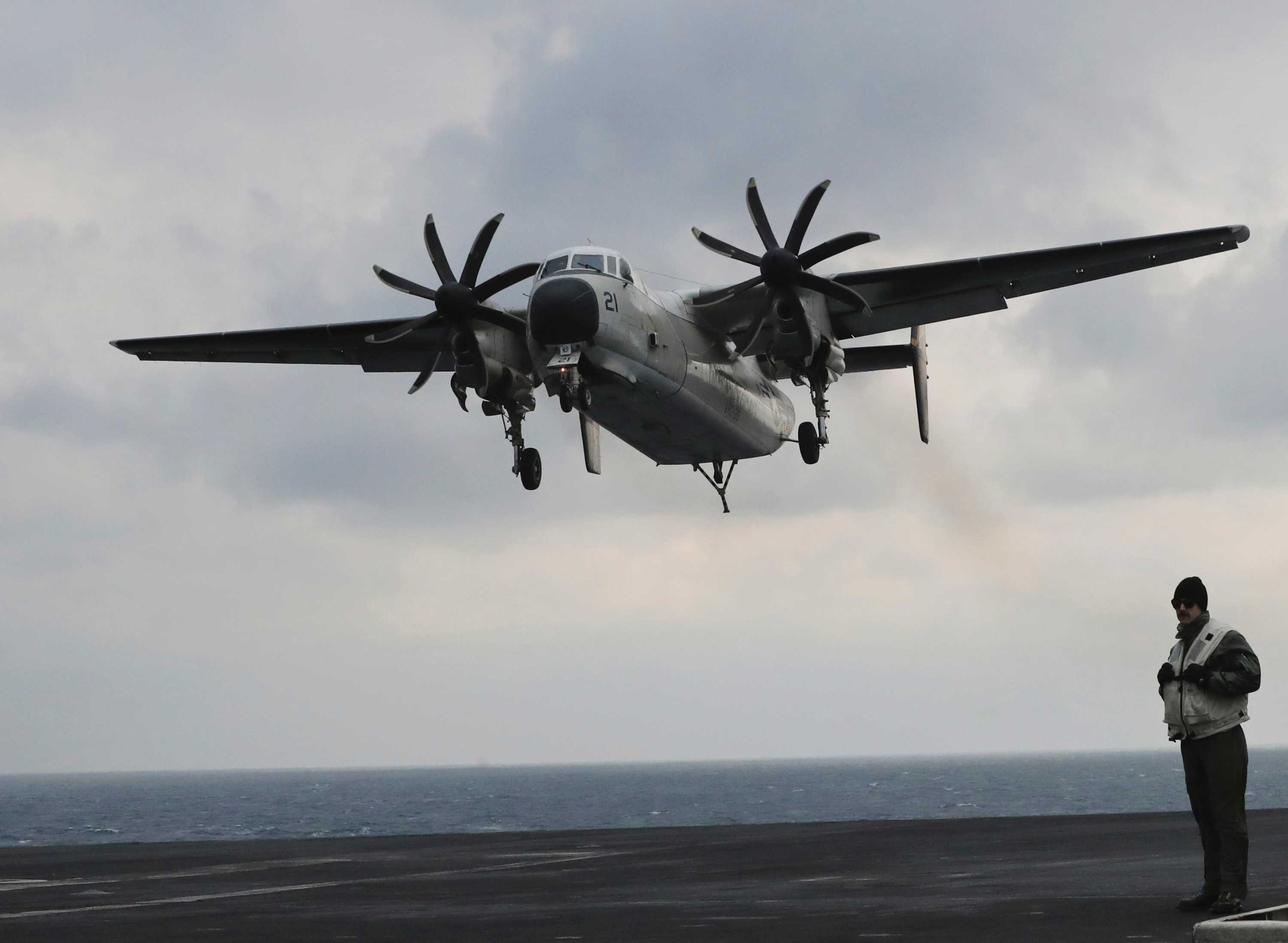US Navy C-2 Greyhound takes off.