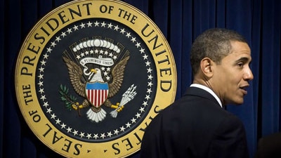 US President Barack Obama speaks during a ceremony in the Eisenhower Executive Office Building to swear in his staff in Washi...