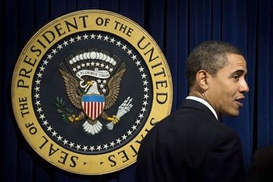 US President Barack Obama speaks during a ceremony in the Eisenhower Executive Office Building to swear in his staff in Washi...