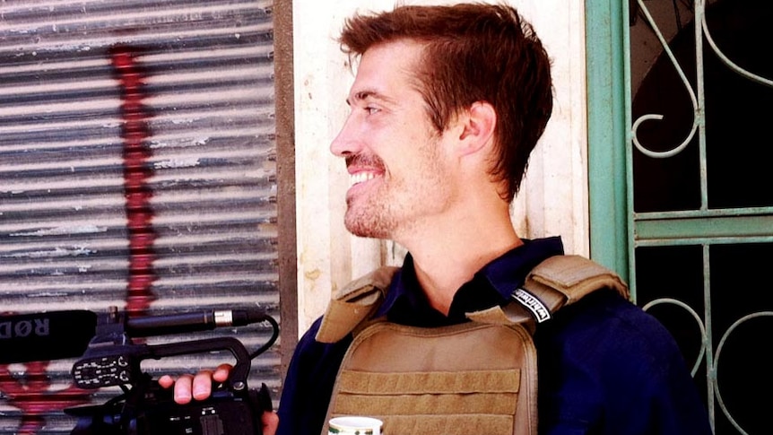 Journalist James Foley at work in Aleppo