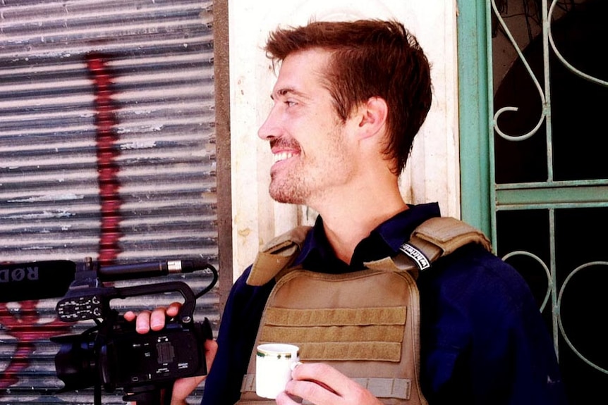 Journalist James Foley at work in Aleppo